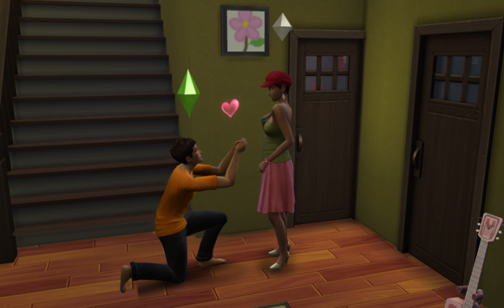 Reef, on one knee, proposes to his girlfriend.