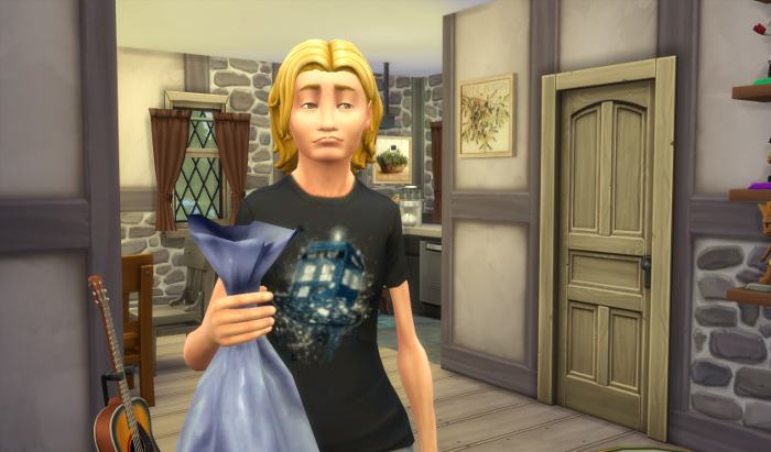 Sam is holding the garbage in the house alone - looking rather sad.
