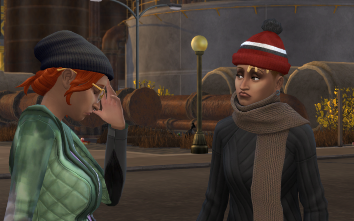 Clara and Lee Drifter looking a upset ouside a big industrial tank in their winter outfits.
